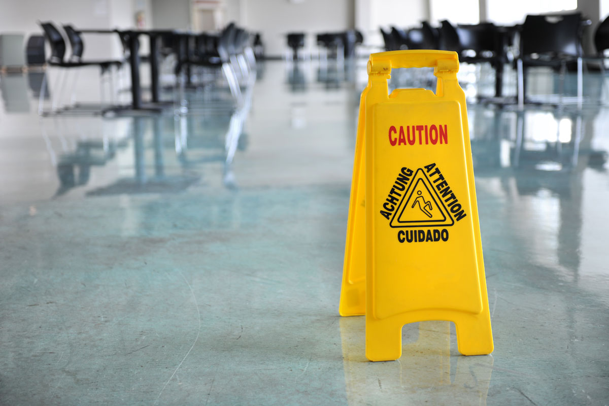 caution sign on freshly mopped floor
