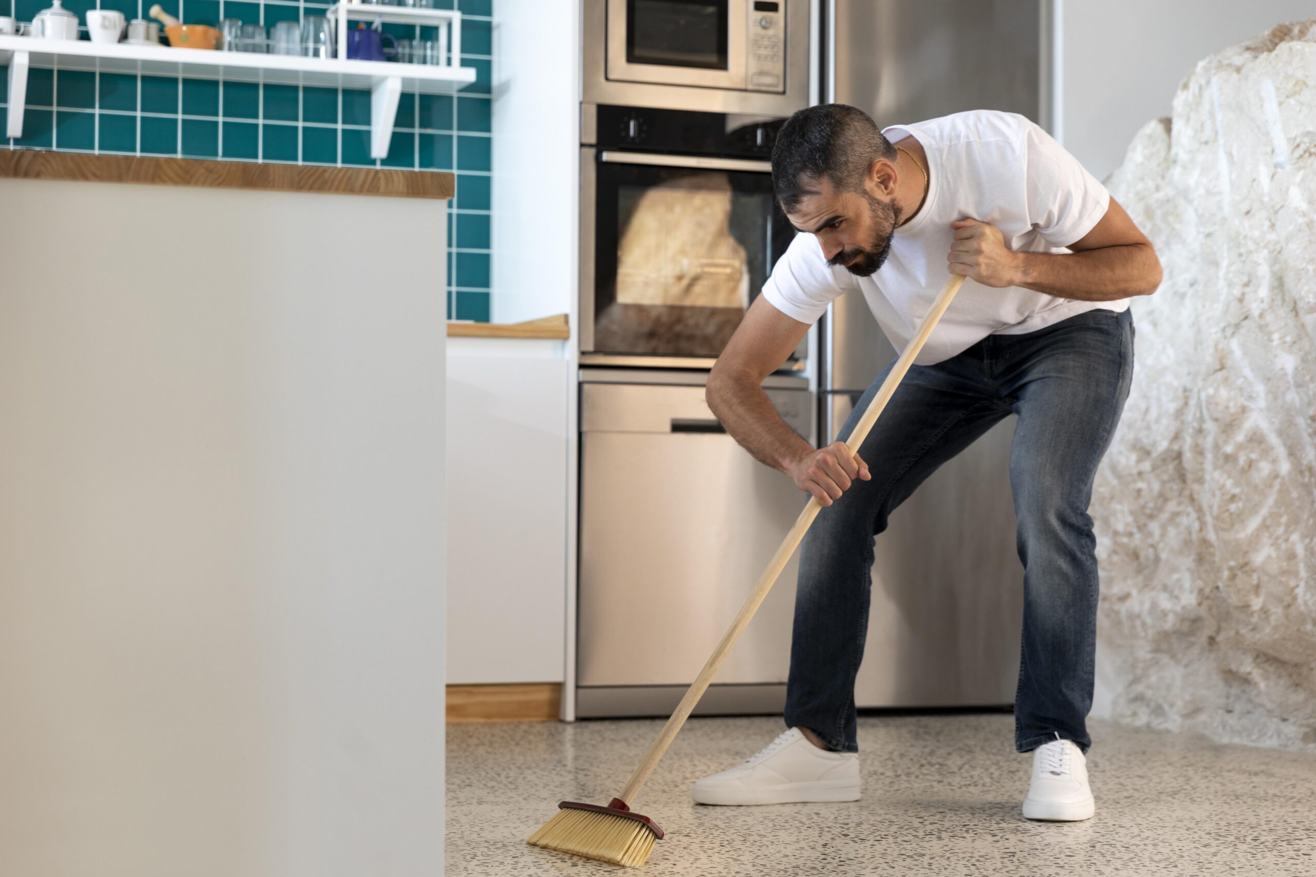 sweeping kitchen floor